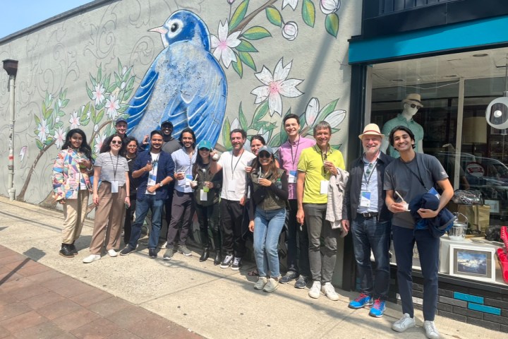 a group of people standing in front of a building